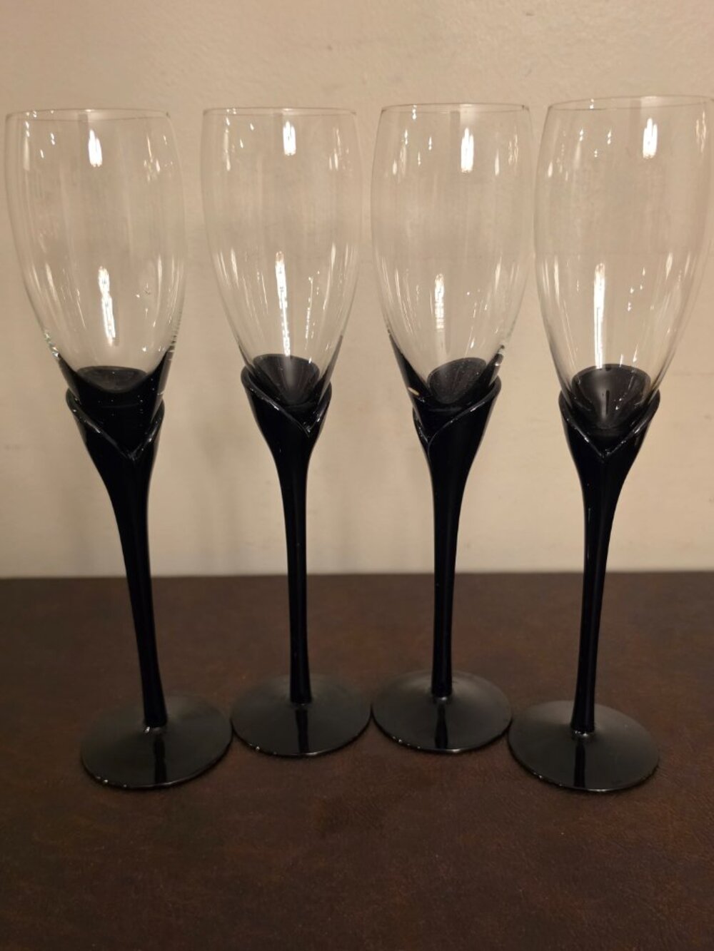 Set of 4 - Vintage Colony Champagne Flutes Sleek black stem & base.